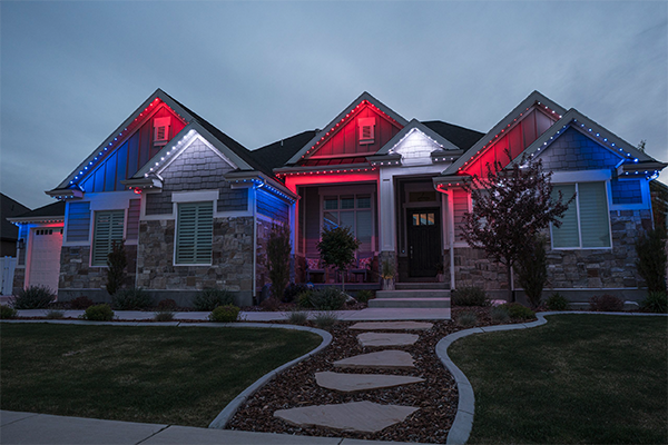 Patriotic lit house with Jellyfish Outdoor Lighting System